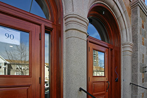 HSPH 90SmithSt exterior door in brown color and some glasses